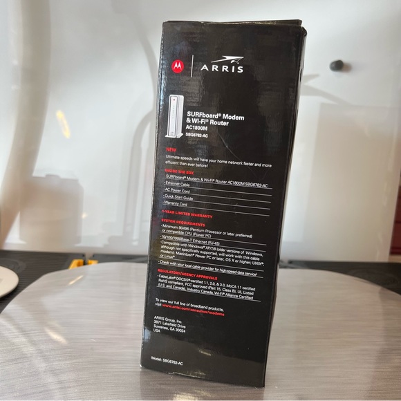 Motorola/Arris 
SURFboard® Cable Modem & Wi-Fi® Router
Excellent condition - Picture 7 of 13